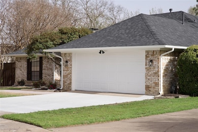 View of front of property featuring brick siding, 
