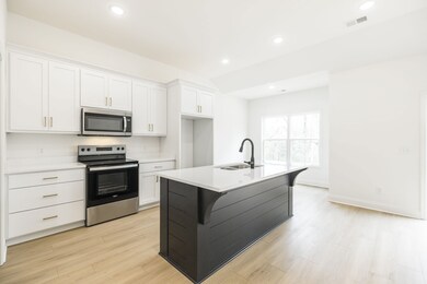 beautiful custom cabinetry with large island