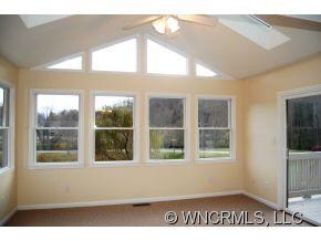 sunroom overlooking pond