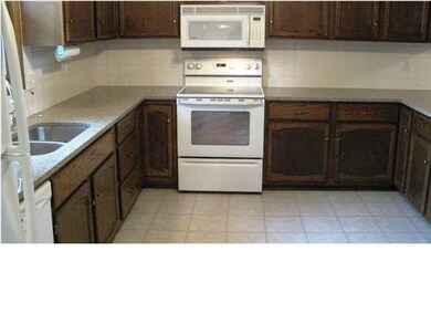 Open kitchen with microwave, convection oven, dish