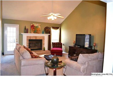 This huge living room offers vaulted ceilings and 