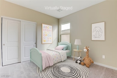 Carpeted bedroom with  closet.