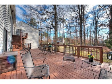 Enjoy views of the spacious yard from this oversiz