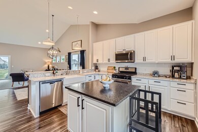 Stainless appliances, granite countertops, white subway tile backsplash, tons of cabinets and drawers, what more could you be looking for?