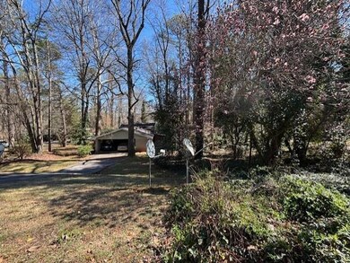 View of yard featuring a carport