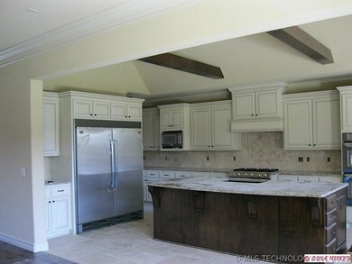 Vaulted kitchen  w/ beams and large island