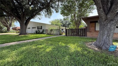 View of yard with a garage