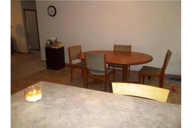 Other. Main level living room opens to dining area