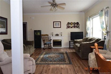 Open Family room with gas fireplace and new floors