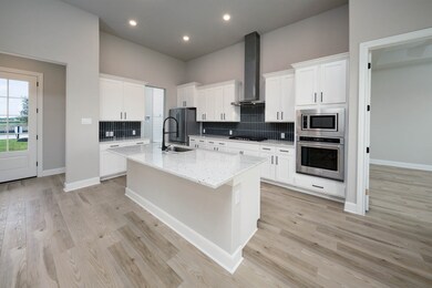 With an open layout, the kitchen island becomes th