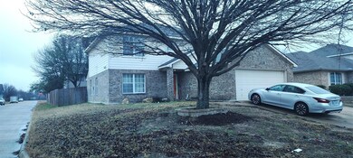 View of front of property with concrete driveway, 