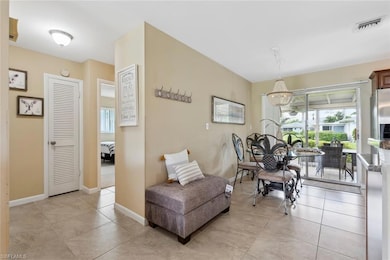 Sitting room featuring light tile patterned floors