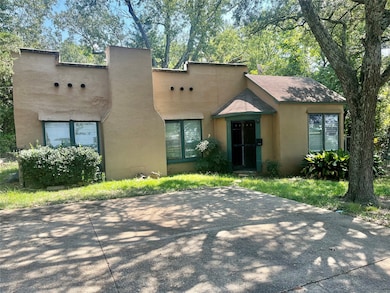 View of front of property with stucco siding