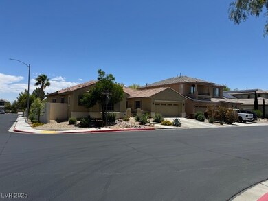 View of front of property featuring an attached ga