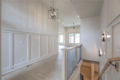 Front foyer has a feature wall as you enter into the home.