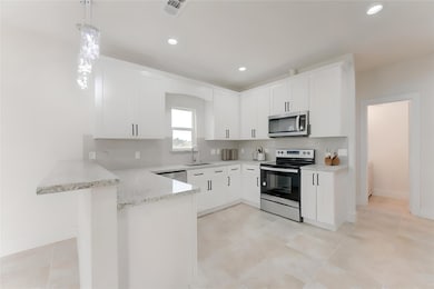 Modern kitchen with sleek stainless steel applianc
