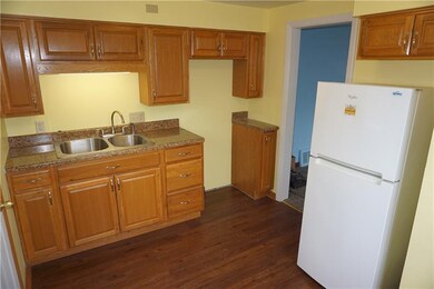The Eat-in Kitchen is all new including the oak fa