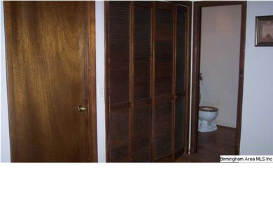 Laundry area + access to one of 3 baths from main 