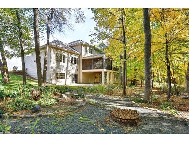 Beautiful rear view showing the new screened porch