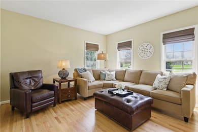 Living Room - hardwoods through out, flooded with