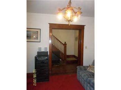 Living Room Living room with pocket door leading t