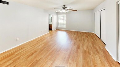 Unfurnished bedroom featuring light wood-style flo