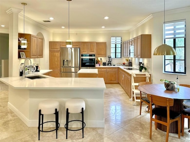 Fabulous kitchen with island, quartz counter tops, induction cooktop, 2024 S/S appliances.