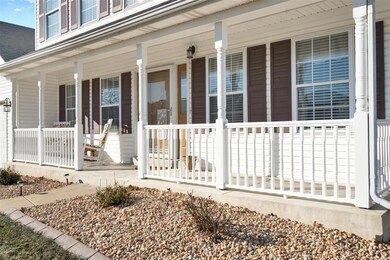 Inviting Covered Front Porch lets you enjoy the de