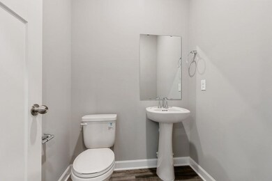 (Photo of similar home, finishes will vary) A powder bath located on the main floor!