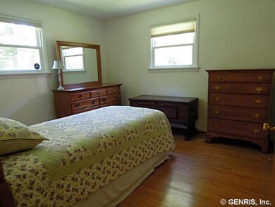 Bedroom. Hardwood floors and thermal pane windows 