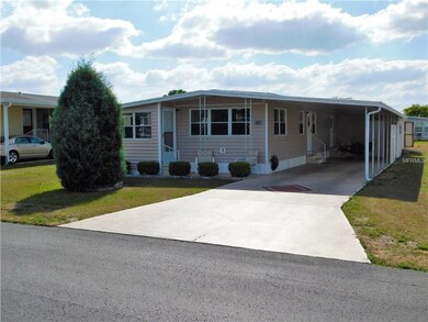 Carport is large and front of home offers covered 