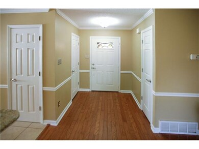 Nice Entry - Neutral yet warm Paint, Hardwoods.