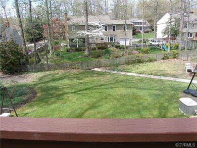 Large Rear Deck overlooking lush green lawn!