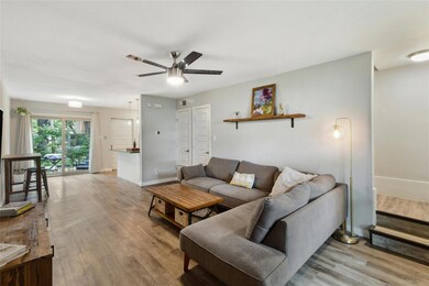 Living area featuring light wood-style flooring a