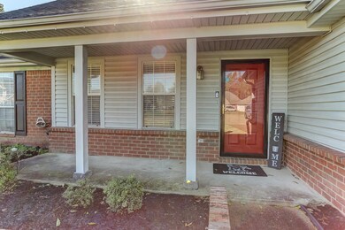 Entrance to property with covered porch