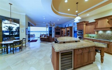 Kitchen with casual dining area and Family room wi