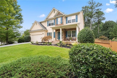 Craftsman house with covered porch and driveway