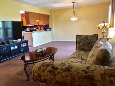 Living room open to the Dining room and the kitche