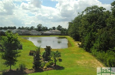 What a view! Fully stocked pond, grab your fishing