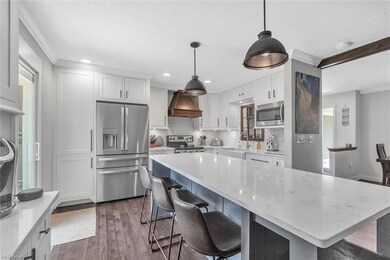 Gorgeous Kitchen! Huge Island, Plenty of Cabinet and Counter Space.