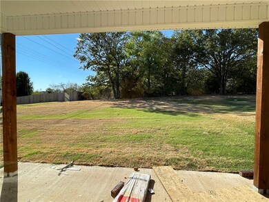View From Covered Patio Looking at the Back Yard
