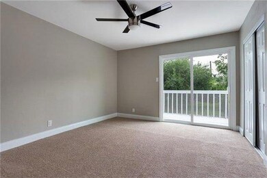 Carpeted empty room featuring healthy amount of n