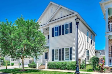 View of front of property featuring a balcony