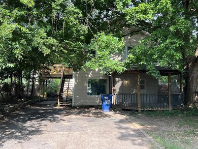 Rear view of property with a wooden deck