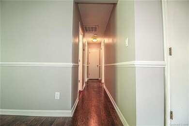 The hallway to the right that leads to the bedrooms!