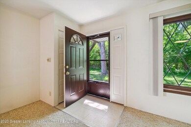 3940 Hunters Ridge Dr unit 3, Lansing, MI 48911 - photo 7