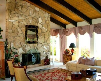 Living room features flu height Palos Verdes Stone