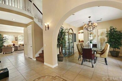 Formal Dining Room with Distinctive Arches and Ita