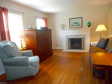 This living room is so nice and cozy with a firepl