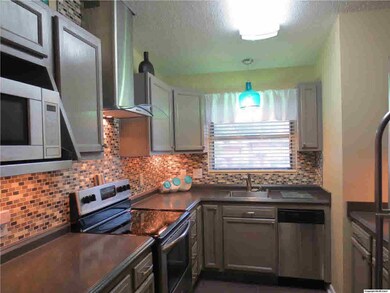 W O W ! Take a look at this kitchen ! I can share the before pics with you just email me and I will be happy to! ITS ALL NEW here, cabinets, top of the line laminate countertops,tiled backsplash,all SS appliances lighting and tile flooring!!!